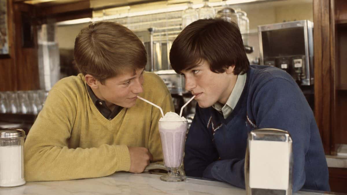 Retro Slogans Only Boomers Still Use — and Why They're Hilarious 7 Youths at a soda fountain