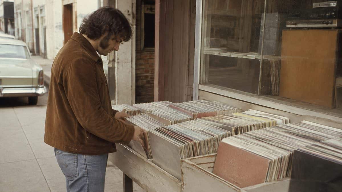 Retro Slogans Only Boomers Still Use — and Why They're Hilarious 8 Authentic 1970s photo of a street vendor or record store