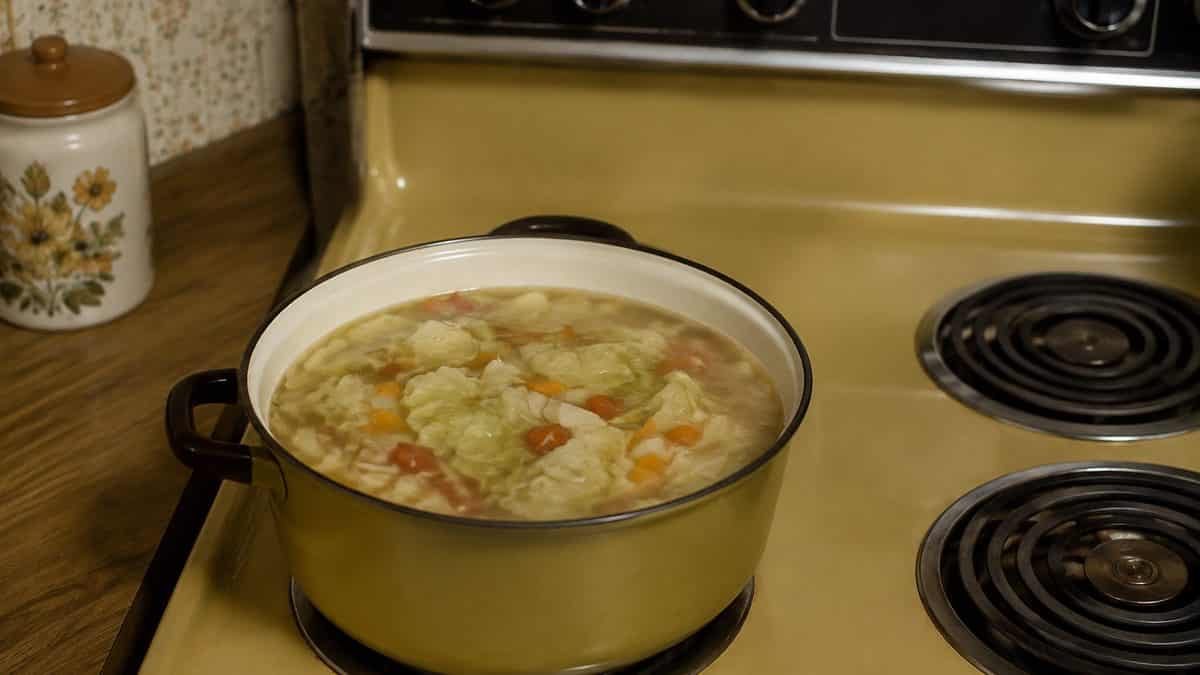 Cabbage soup cooking on a 1970s stove