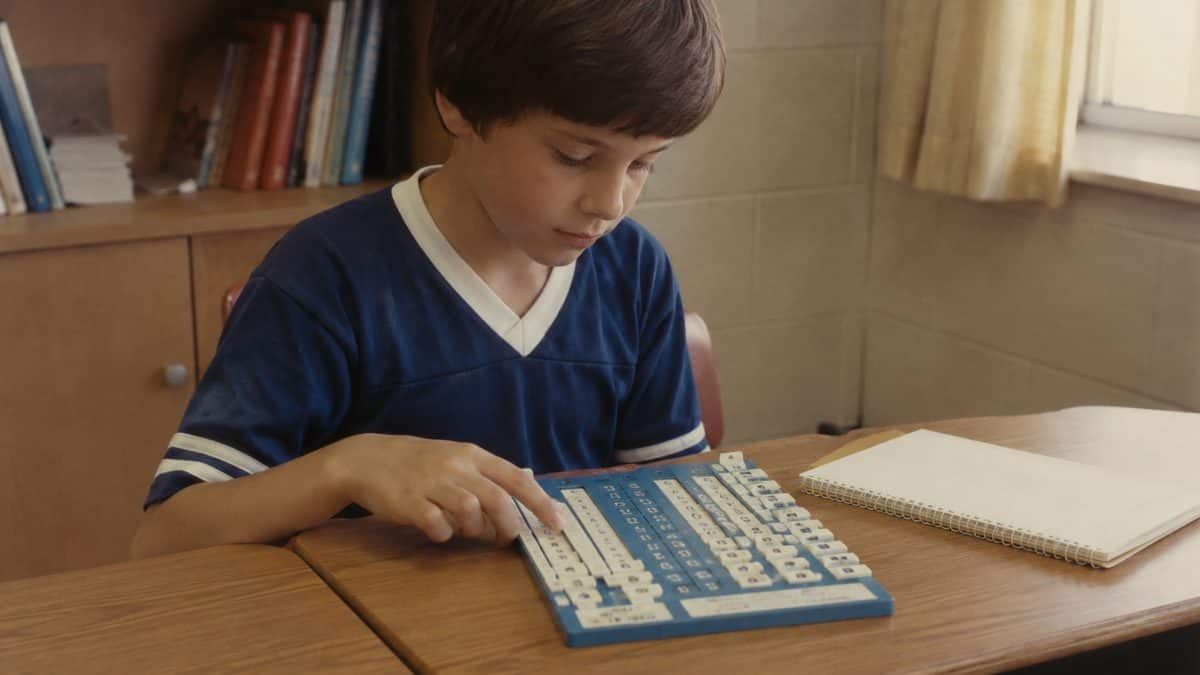 School Supplies Every '80s Kid Needed That Gen Alpha Wouldn't Recognize 4 Child using a multiplication table slider