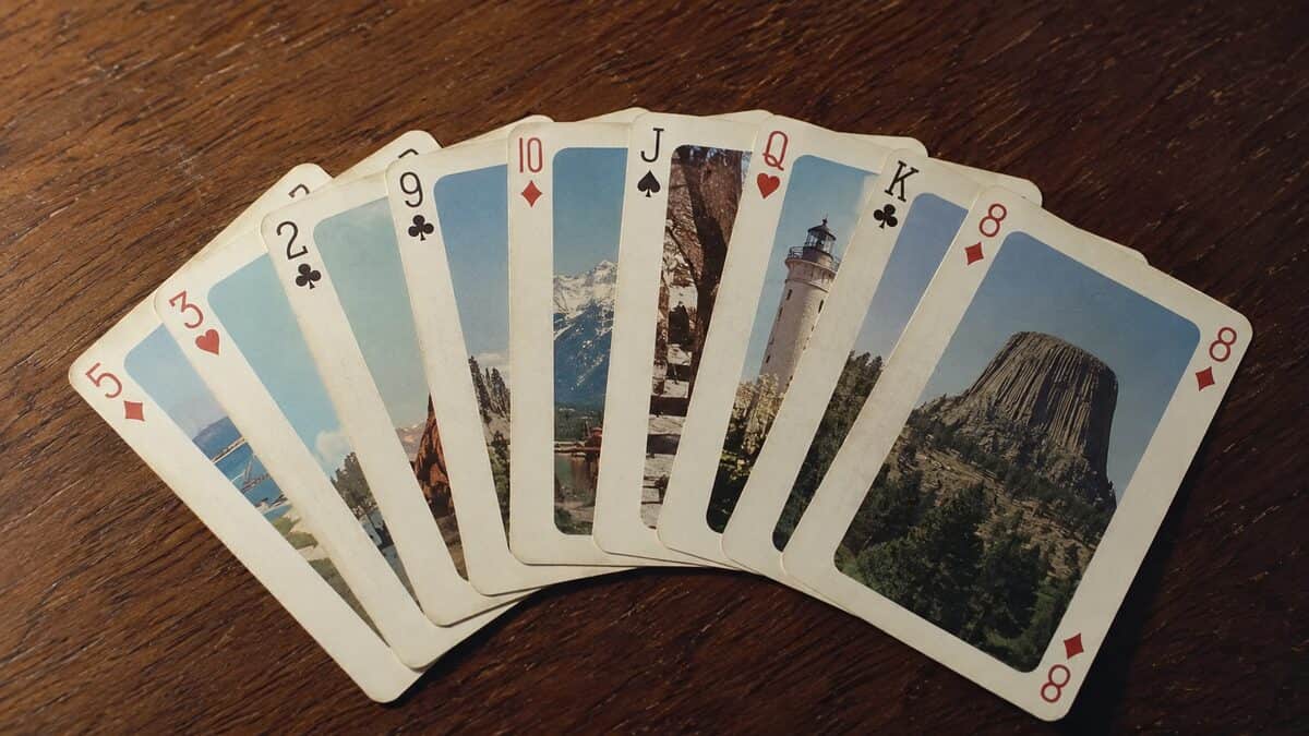 Cheap Vacation Souvenirs That Are Now Worth Keeping Forever 14 Vintage souvenir playing cards fanned out