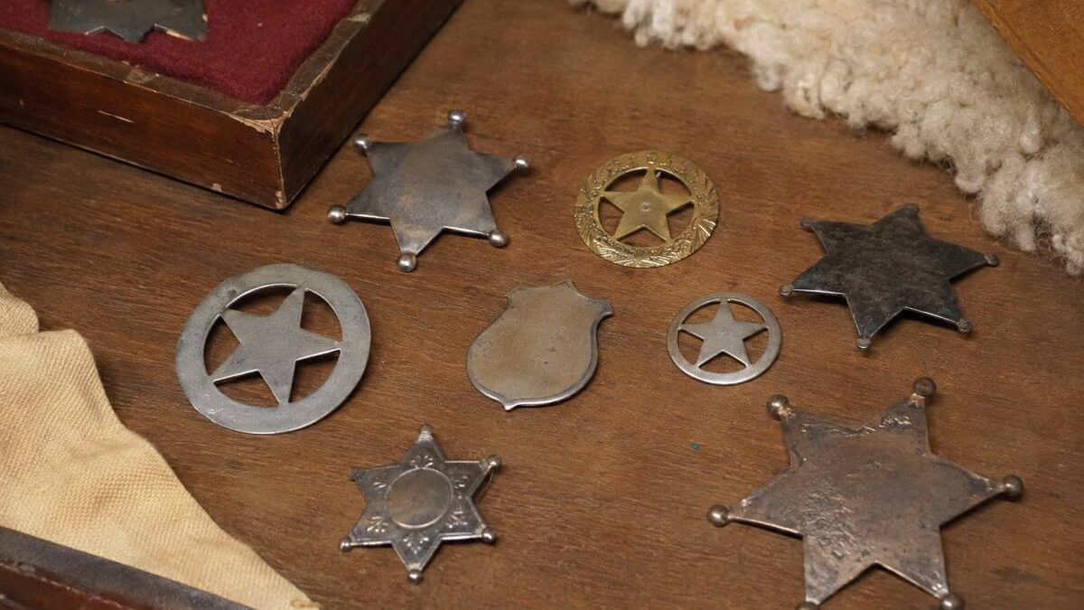 Cheap Vacation Souvenirs That Are Now Worth Keeping Forever 8 Real vintage souvenir badges from a frontier town