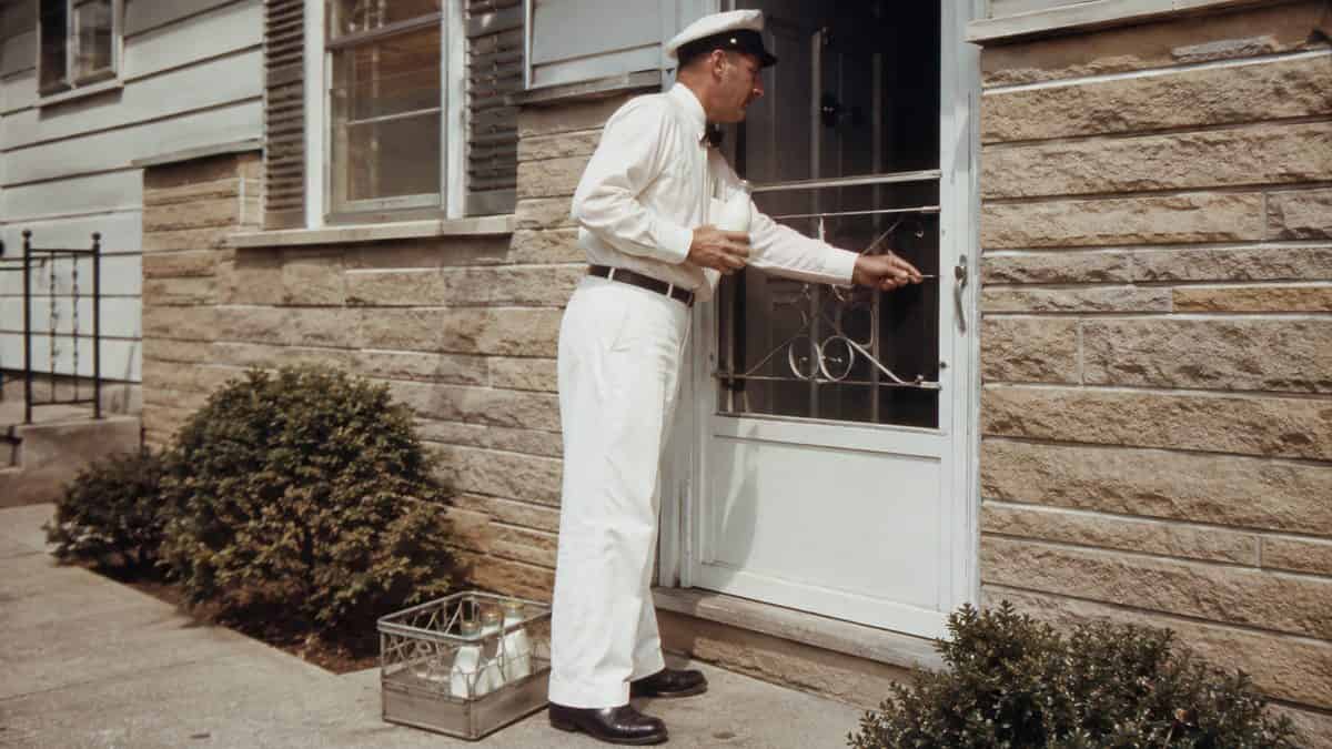 13 Things You Could Buy for a Dollar in the '60s 12 1960s milkman making a delivery.