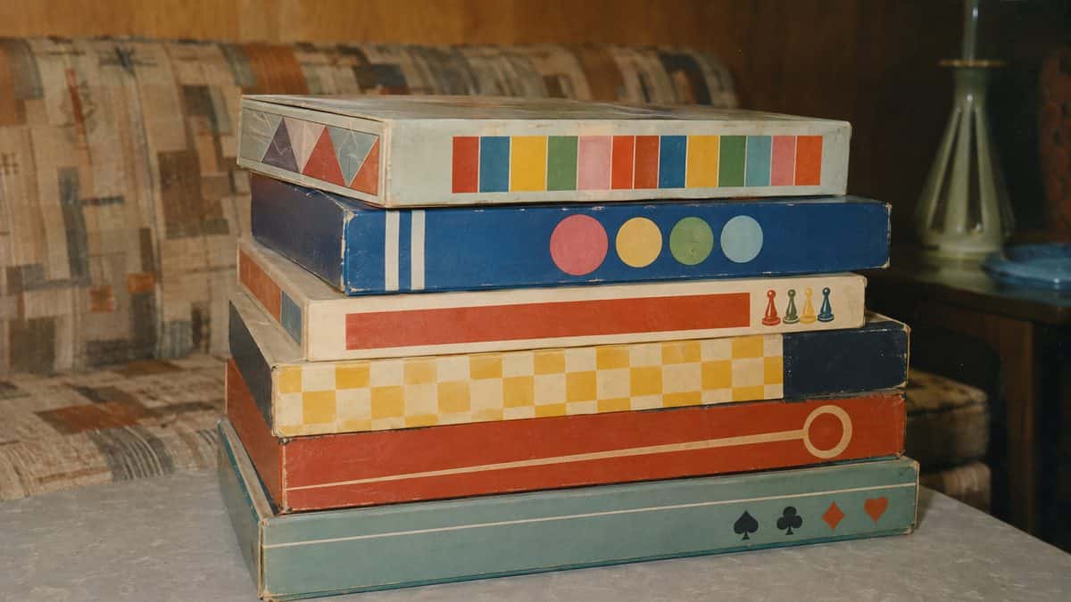 Household Items Every Family Owned That Are Worth a Fortune Now 14 Real photograph of a stack of authentic 1960s board games