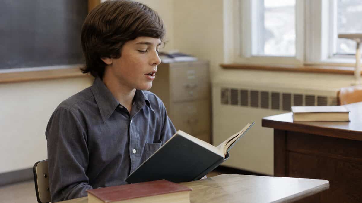 13 Things You Had to Memorize in School That Are Now Obsolete 11 Student reciting from a textbook
