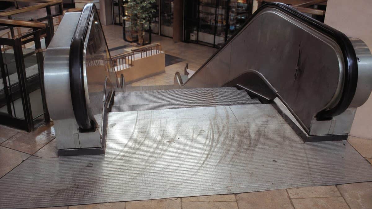 What Kids Did at the Mall That Would Seem Suspicious Today 6 Kids playing on or near mall escalators