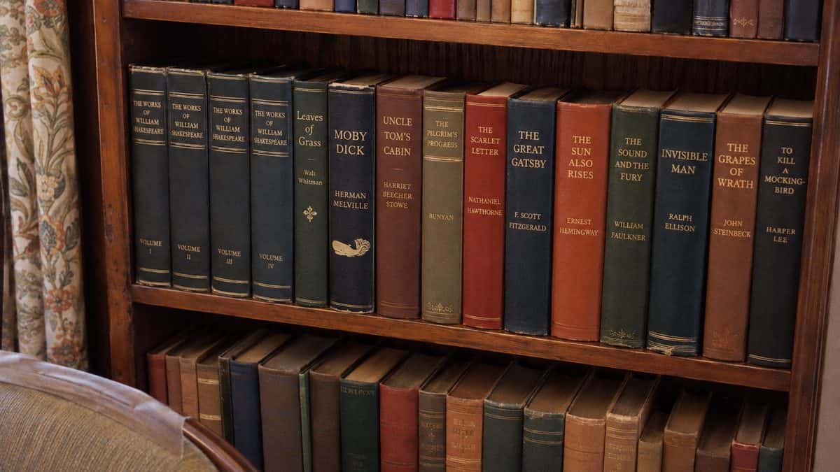 16 Things Everyone Collected That Are Worth Big Money Today 7 Real bookshelf with legible spines