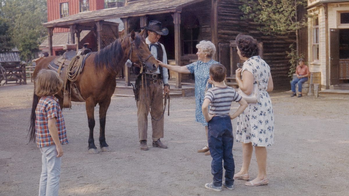12 Iconic Roadside Attractions from the Sixties and Seventies 9 Genuine vintage photo of tourists or actors at Frontier Town, New York.