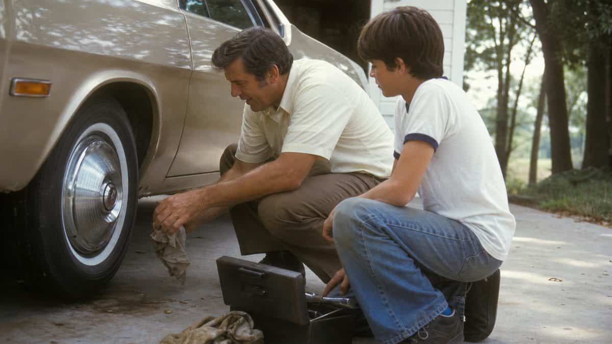 Household Skills Worth Relearning That Could Save You Thousands 8 Father teaching car maintenance