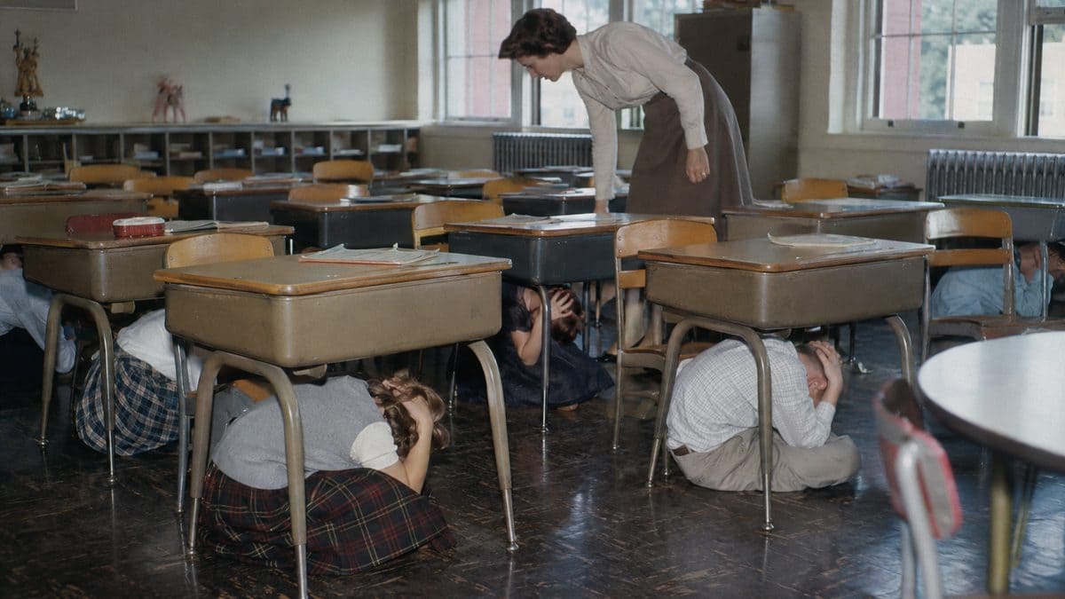Authentic 1950s photo of duck and cover drill
