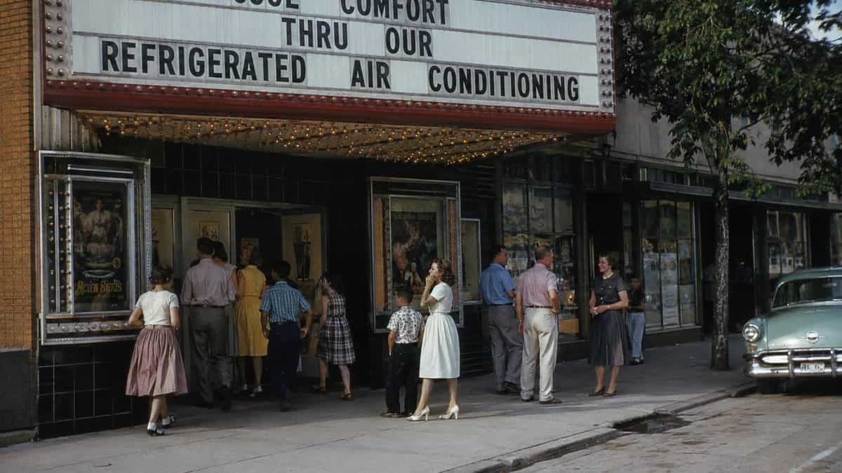 1950s movie theater marquee advertising AC