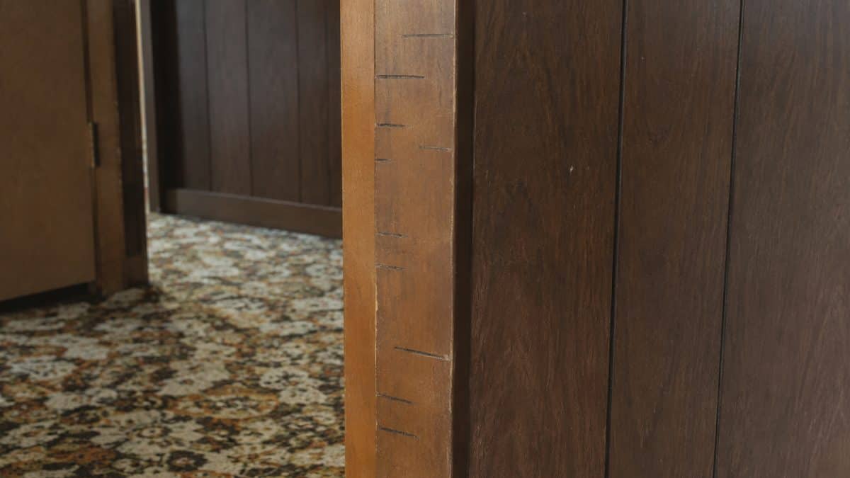 14 Things Every Kid With Wood-Paneled Walls Remembers 11 Childhood height chart marked on a wall or door frame