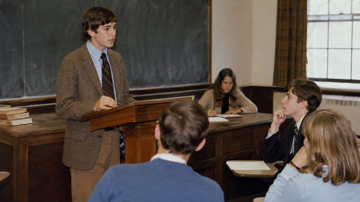 12 Required High School Classes That Disappeared 7 Student at a debate podium