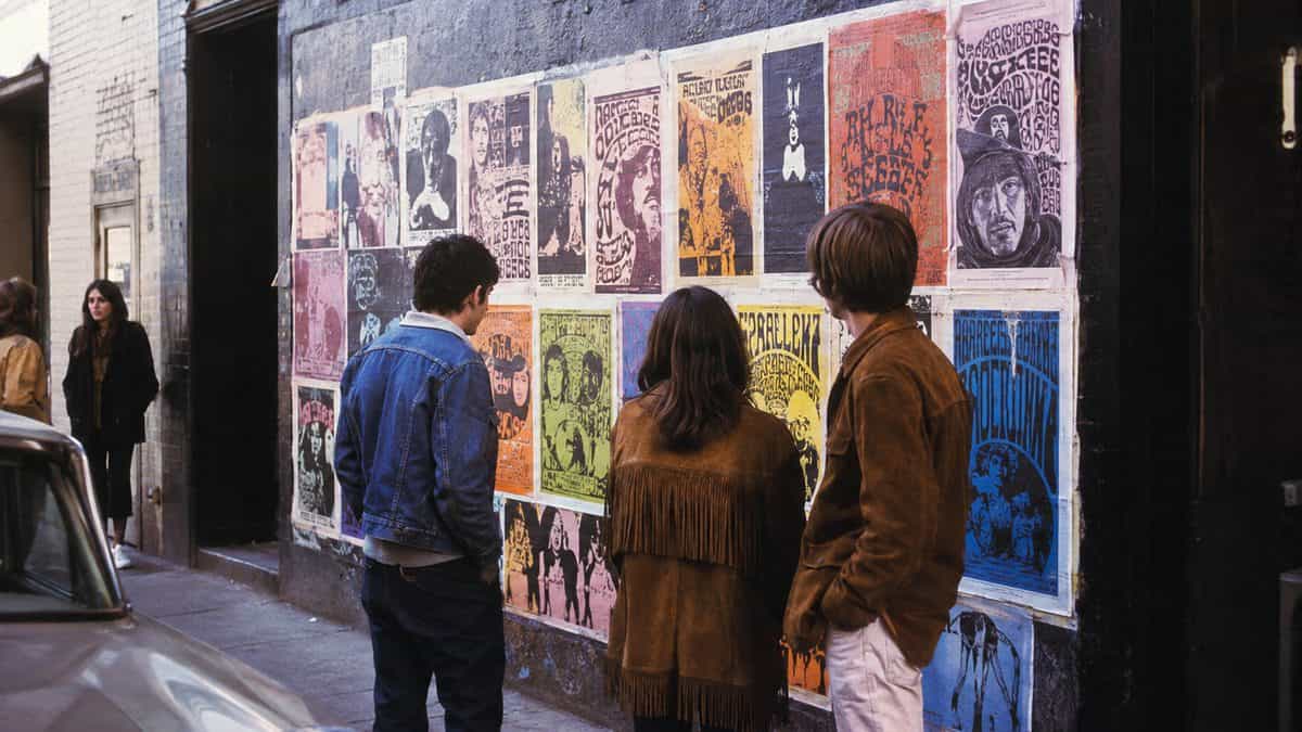 Authentic 1960s rock concert posters on a wall