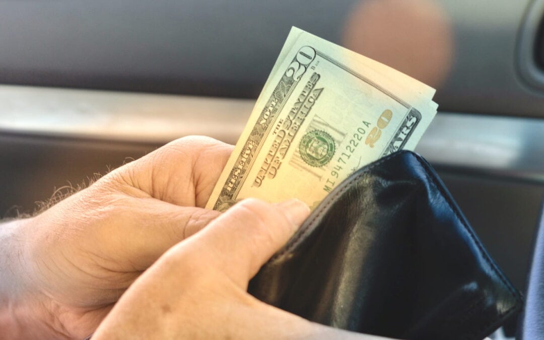 paying a car detailer