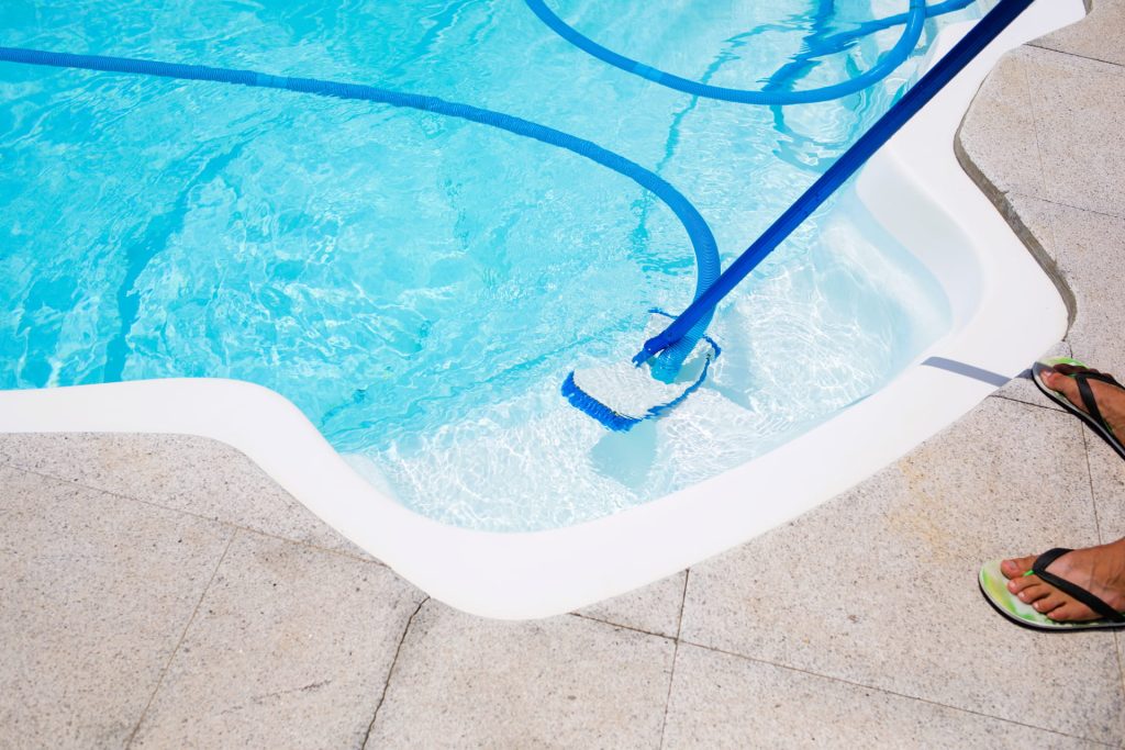 cleaning-pool-with-vacuum-cleaner-cleaning-equipment