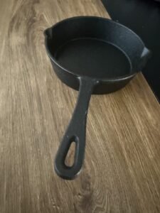 a cast iron skillet on kitchen counter