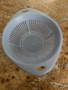 strainer on kitchen counter