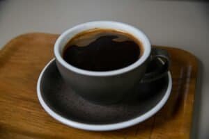 a dark black coffee on plate