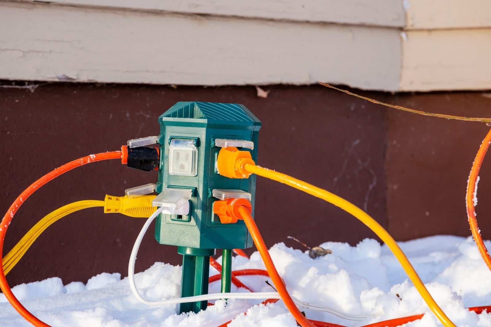 Best Outdoor Smart Outlets in 2026: Weather Ratings, Cold Tolerance, and Real Range