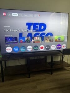 a tv sitting on a tv stand