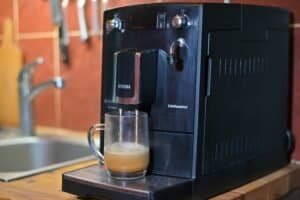 a home espresso machine making a cup