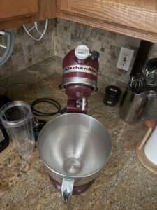 a stand mixer bowl in kitchen on counter