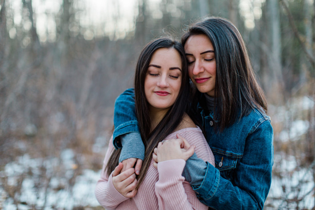 same gender couple female gay couple kissing outside intimate same sex engagement session tips grey loft studio ottawa wedding photographer ottawa wedding videographer wedding photo affordable wedding photographer cheap wedding photographer budget photographer kanata wedding photographer 