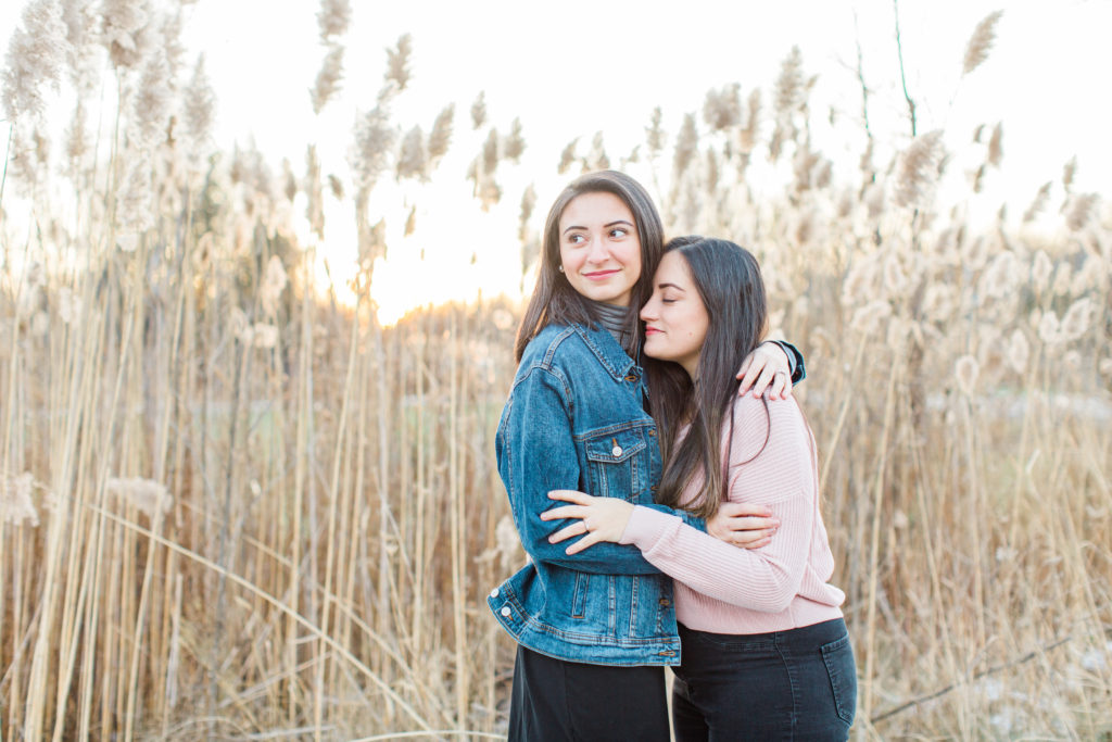 same gender couple female gay couple kissing outside intimate same sex engagement session tips grey loft studio ottawa wedding photographer ottawa wedding videographer wedding photo affordable wedding photographer cheap wedding photographer budget photographer kanata wedding photographer 