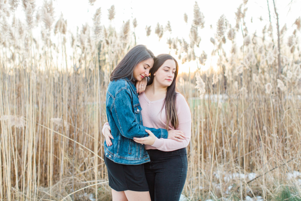 same gender couple female gay couple kissing outside intimate same sex engagement session tips grey loft studio ottawa wedding photographer ottawa wedding videographer wedding photo affordable wedding photographer cheap wedding photographer budget photographer kanata wedding photographer 
