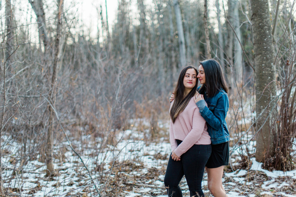 same gender couple female gay couple kissing outside intimate same sex engagement session tips grey loft studio ottawa wedding photographer ottawa wedding videographer wedding photo affordable wedding photographer cheap wedding photographer budget photographer kanata wedding photographer 