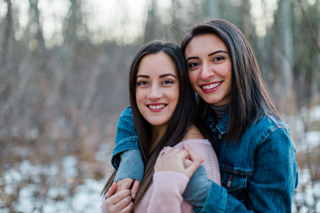 same gender couple female gay couple kissing outside intimate same sex engagement session tips grey loft studio ottawa wedding photographer ottawa wedding videographer wedding photo affordable wedding photographer cheap wedding photographer budget photographer kanata wedding photographer 
