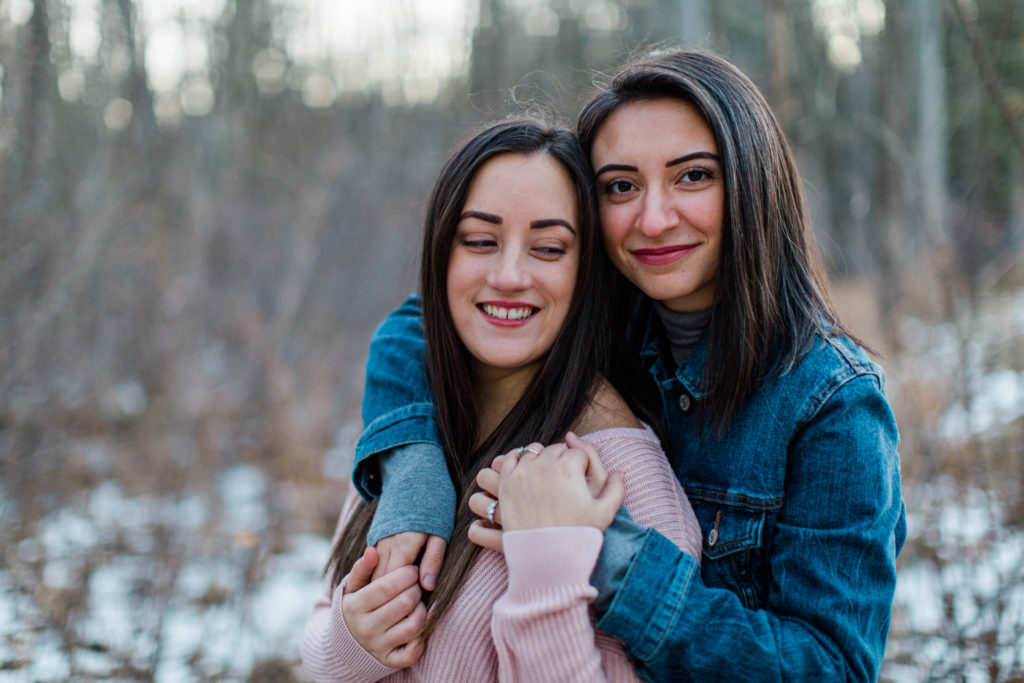 same gender couple female gay couple kissing outside intimate same sex engagement session tips grey loft studio ottawa wedding photographer ottawa wedding videographer wedding photo affordable wedding photographer cheap wedding photographer budget photographer kanata wedding photographer 