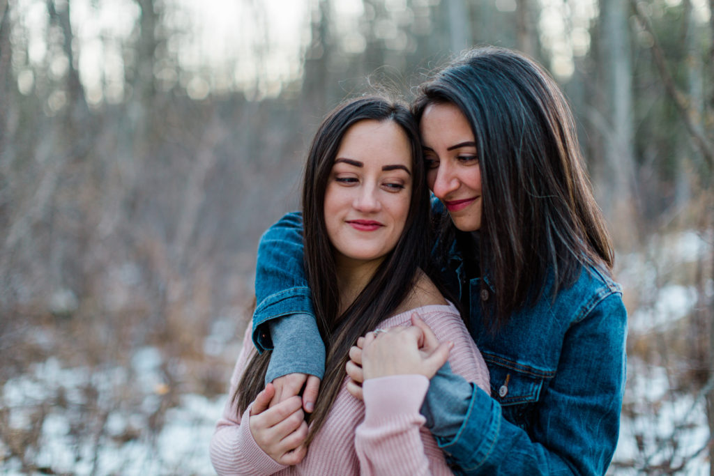 same gender couple female gay couple kissing outside intimate same sex engagement session tips grey loft studio ottawa wedding photographer ottawa wedding videographer wedding photo affordable wedding photographer cheap wedding photographer budget photographer kanata wedding photographer 