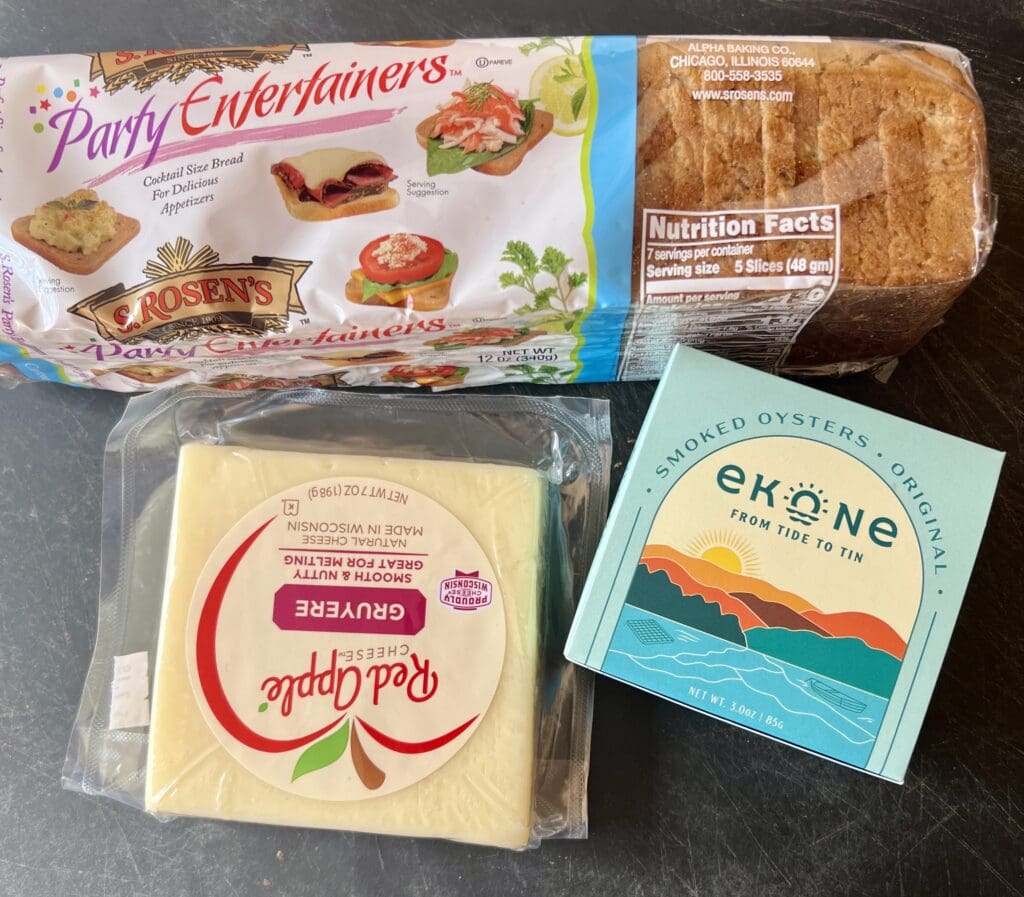 Party Entertainers bread, cheese, and smoked oysters for tinned fish capsule lunches.