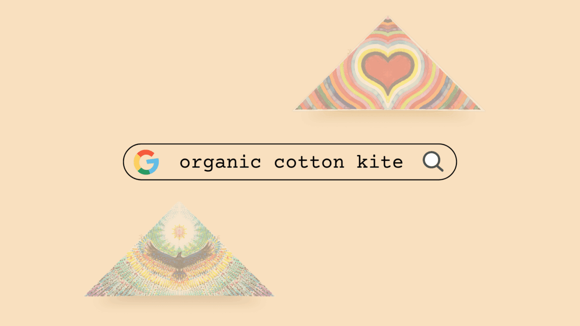 Colorful organic cotton kites with heart and rainbow patterns for eco-friendly flying.