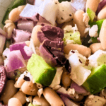 Colorful Mediterranean bean salad with vegetables and beans close-up.