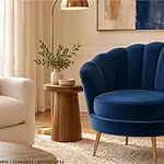 Elegant blue shell-shaped accent chair in a cozy living room setting.