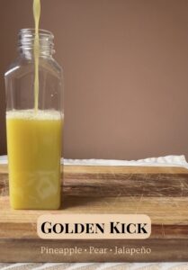 Fresh Golden Kick juice with pineapple, pear, and jalapeño ingredients.