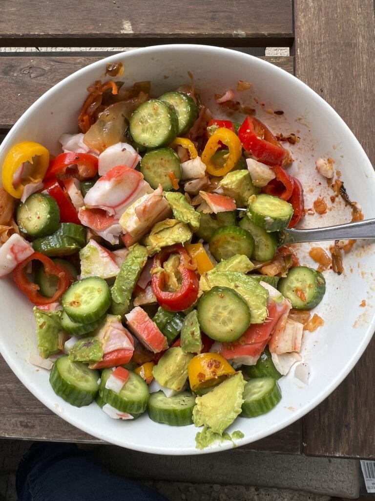 Spicy cucumber crab salad with avocado and lime — light, refreshing, and perfect for summer. Get the full recipe on redcypressdesigns.com.