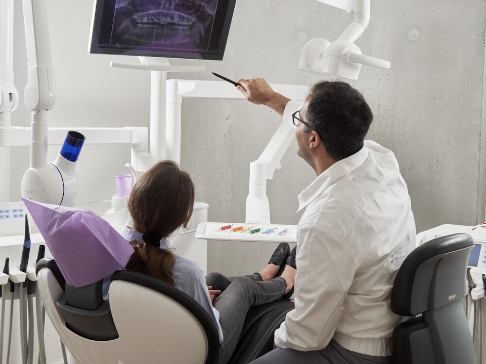 Al Hokail Medical Group logo displayed on an interactive digital screen representing healthcare innovation