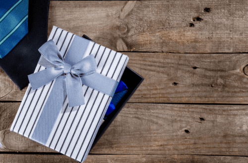 Gift box with tie, watch, and accessories for Father’s Day presents.