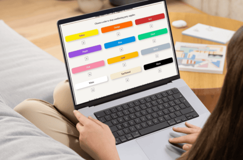 Person using a laptop displaying reusable solid-color Amazon link patterns created in WordPress.
