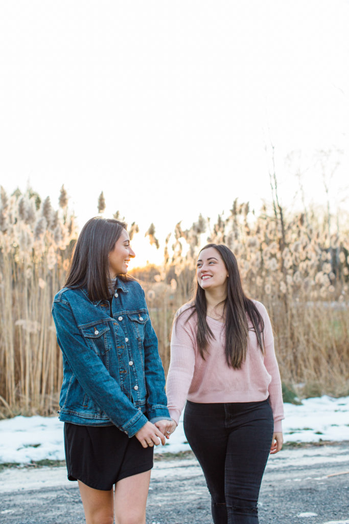 same sex women engagement session smiling at each other same gender couple female gay couple kissing outside intimate same sex engagement session tips grey loft studio ottawa wedding photographer ottawa wedding videographer wedding photo affordable wedding photographer cheap wedding photographer budget photographer kanata wedding photographer 
