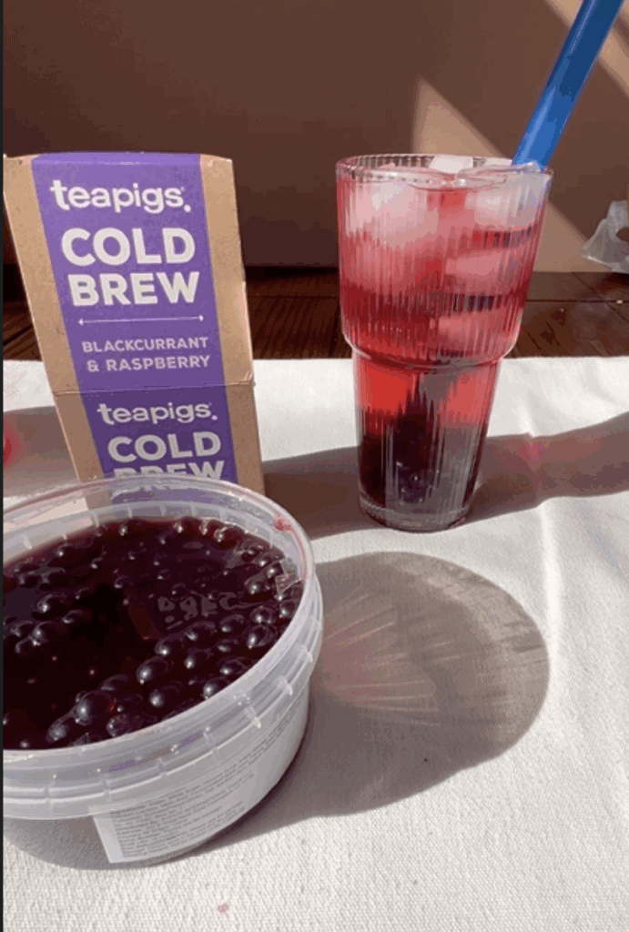 Bright berry beverages with tea bags, perfect for a healthy, refreshing lunch.