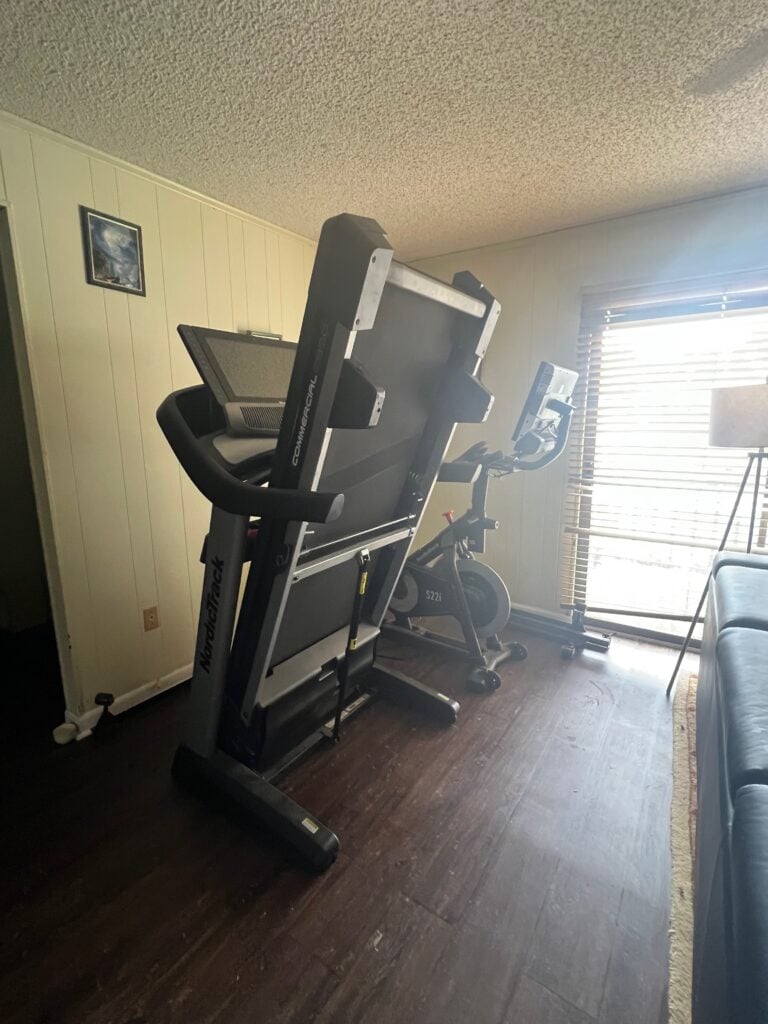 Treadmill folded for storage.