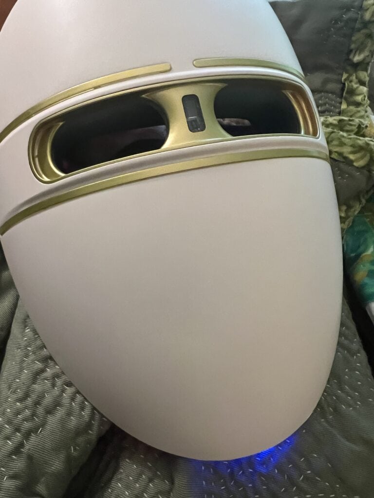 Futuristic device with sleek design and gold accents for modern aesthetics.