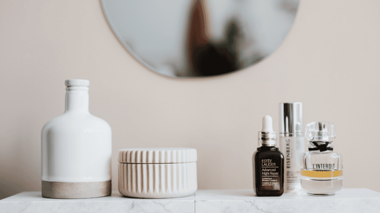 Skincare products on a bathroom counter, including serums and creams, ideal for FSA spending.