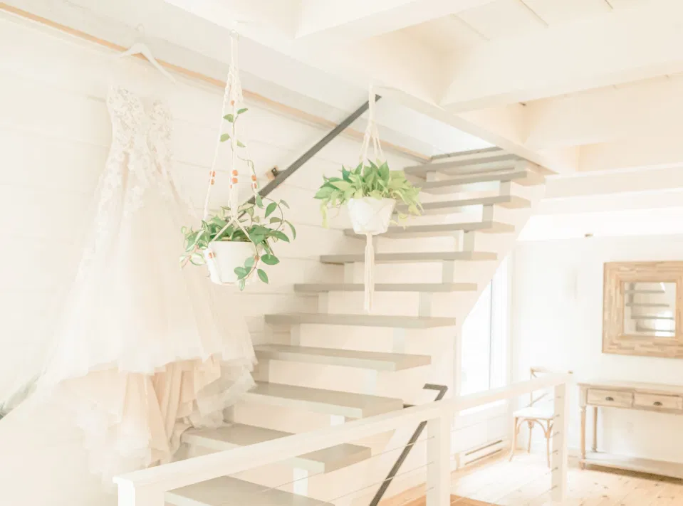 Wedding Dress Hanging in the Garden House - Le Belvedere - Wakefield Quebec - Photographer Bethany Barrette - Styling Details on Wedding Day - Grey Loft Studio -Amy &. Nick | Le Belvedere at Wakefield in Quebec - Ottawa Wedding Venue - Grey Loft Studio