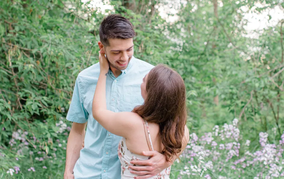 Ideas for what to wear for Engagement Photography, Modern Engagement Session Inspiration Wardrobe Ideas. Unsure of what to wear for your engagement photos, we've got you! Romantic white with Pink Flower dress for Spring Engagement in Ottawa. Grey Loft Studio is Ottawa's Wedding and Engagement Photographer for Real couples, showcasing photos that are modern, bright, and fun.